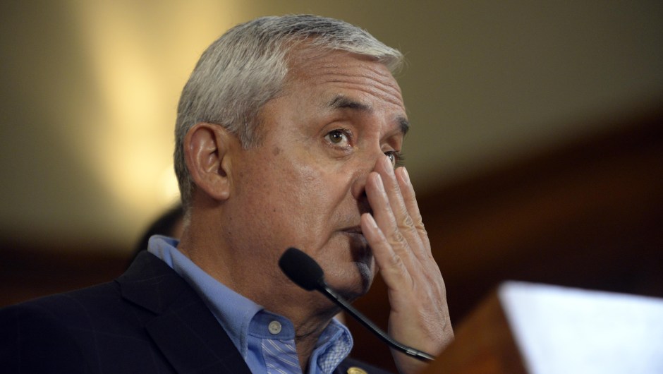 Guatemalan President Otto Perez Molina gestures during a press conference at the presidential residence in Guatemala City on April 17, 2015. Perez Moline informed about the operation carried out by security authorities and members of the International Commission against Impunity in Guatemala (CICIG), that eventually led to the arrest of about 20 people on charges of operating a network of smuggling and tax fraud. AFP PHOTO Johan ORDONEZ (Photo credit should read JOHAN ORDONEZ/AFP/Getty Images)