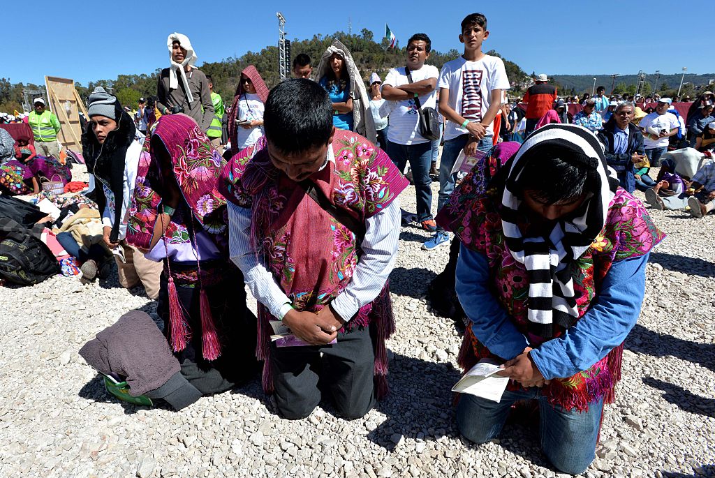 People attend Pope Francis' open-air mass in San Cristobal de las Casas, in Chiapas, on February 15, 2016. Thousands of indigenous Mexicans flocked on Monday to a field in the impoverished southern state of Chiapas to attend Pope Francis' mass in three native languages. AFP PHOTO / MARIO VAZQUEZ / AFP / MARIO VAZQUEZ (Photo credit should read MARIO VAZQUEZ/AFP/Getty Images)