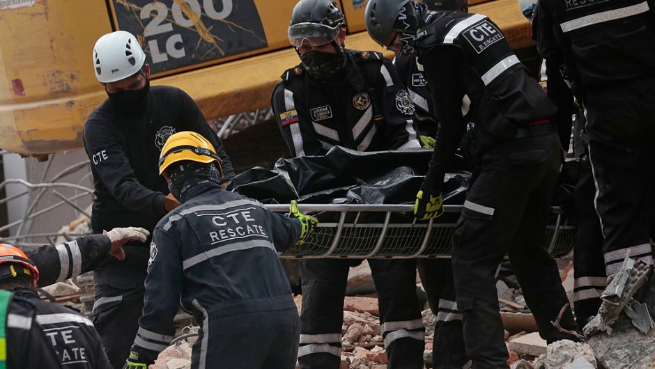 Rescuers retrieve a corpse from the rubble in Portoviejo, Manabi, Ecuador on April 19, 2016. Three days after the powerful 7.8-magnitude quake struck Ecuador's Pacific coast in a zone popular with tourists, 480 people are known to have died, the government said. / AFP / Juan Cevallos (Photo credit should read JUAN CEVALLOS/AFP/Getty Images)