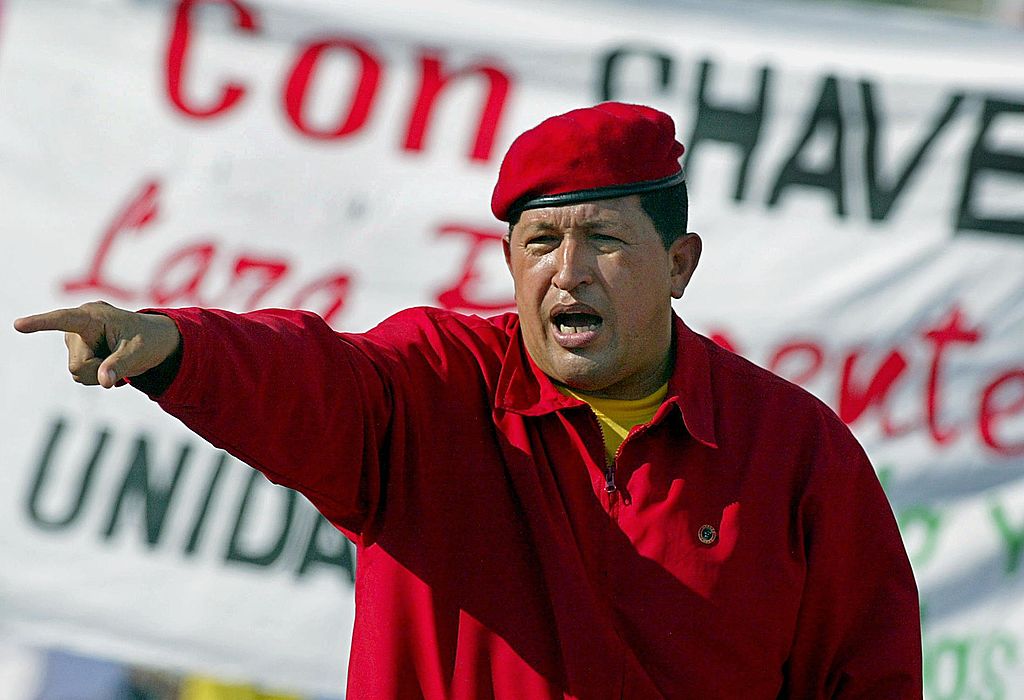 Venezuelan President Hugo Chavez addresses supporters during a demonstration in Caracas 23 August 2003, celebrating his second three-year government (2000-2006). (Photo credit should read JUAN BARRETO/AFP/Getty Images)