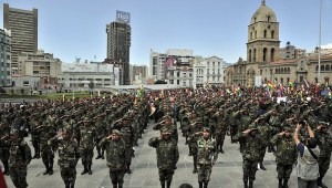 Members of the Armed Forces of Bolivia demonstrate in La Paz, after marching from El Alto in demand of reforms in the military on April 29, 2014. Bolivia sacked some 700 members of the military on April 24 in response to a strike by non-commissioned officers, most of whom, like Bolivian President Evo Morales, are of native origin, and who were protesting the lack of opportunities for advancement in the military and complaining that most of those promoted are white or of mixed-Indian and white heritage. AFP PHOTO / Aizar Raldes (Photo credit should read AIZAR RALDES/AFP/Getty Images)