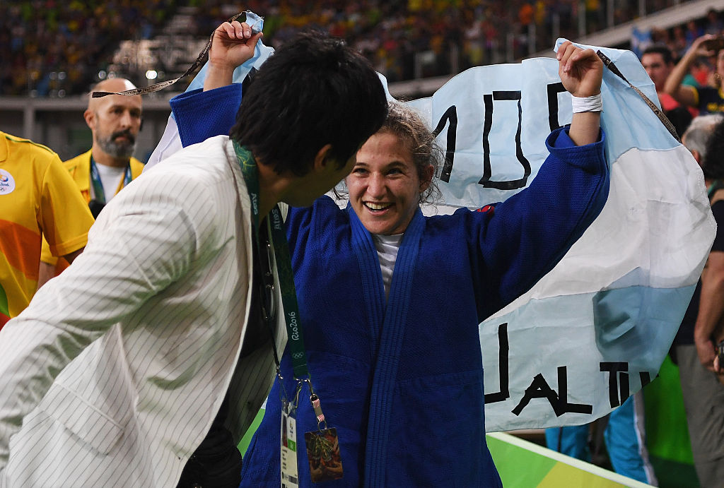 RIO DE JANEIRO, BRAZIL - AUGUST 06: Paula Pareto of Argentina celebrates after defeating Bokyeong Jeong of Korea in the Women's -48 kg Gold Medal contest on Day 1 of the Rio 2016 Olympic Games at Carioca Arena 2 on August 6, 2016 in Rio de Janeiro, Brazil. (Photo by Laurence Griffiths/Getty Images)