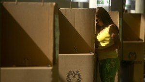 A woman votes in the presidential election on May 25, 2014, in Medellin, Antioquia department, Colombia. AFP PHOTO/Raul ARBOLEDA (Photo credit should read RAUL ARBOLEDA/AFP/Getty Images)