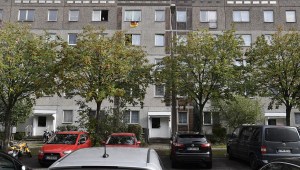 This picture shows the flat (Up Center R) on the last floor of a communist-era housing block in Leipzig Paunsdorf, eastern Germany, where a Syrian man, suspected of plotting a jihadist bomb attack, has been arrested on October 10, 2016. The Syrian man was arrested with the help of two of the fugitive's compatriots, in a case that sparked fresh calls for greater checks on asylum seekers. / AFP / John MACDOUGALL (Photo credit should read JOHN MACDOUGALL/AFP/Getty Images)