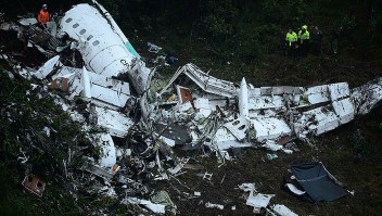 The wreckage of the LAMIA airlines charter plane carrying members of the Chapecoense Real football team is seen after it crashed in the mountains of Cerro Gordo, municipality of La Union, on November 29, 2016. A charter plane carrying the Brazilian football team crashed in the mountains in Colombia late Monday, killing as many as 75 people, officials said. / AFP / Raul ARBOLEDA (Photo credit should read RAUL ARBOLEDA/AFP/Getty Images)