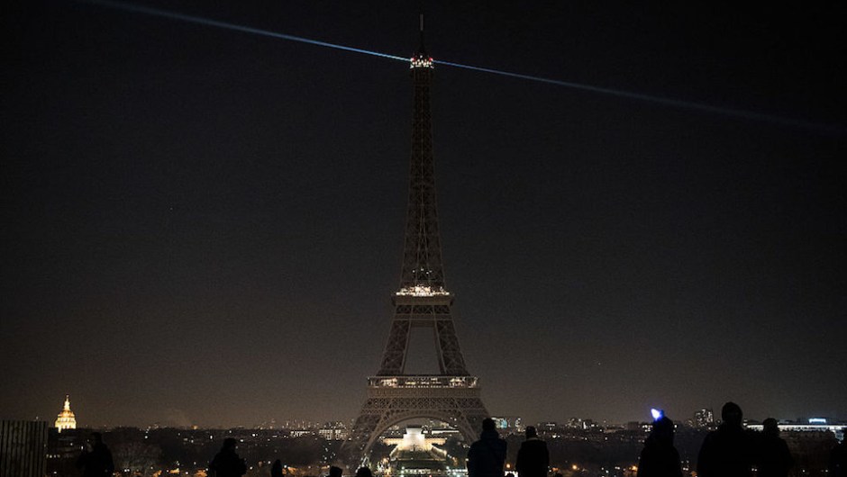 The lights of the Eiffel Tower are exceptionally switched off in Paris, on December 14, 2016, in support of the Syrian city of Aleppo. Shelling and air strikes sent terrified residents running through the streets of Aleppo on December 14, 2016 as diplomats strove to save a deal to evacuate the shrinking rebel-held districts of the city. / AFP / PHILIPPE LOPEZ (Photo credit should read PHILIPPE LOPEZ/AFP/Getty Images)