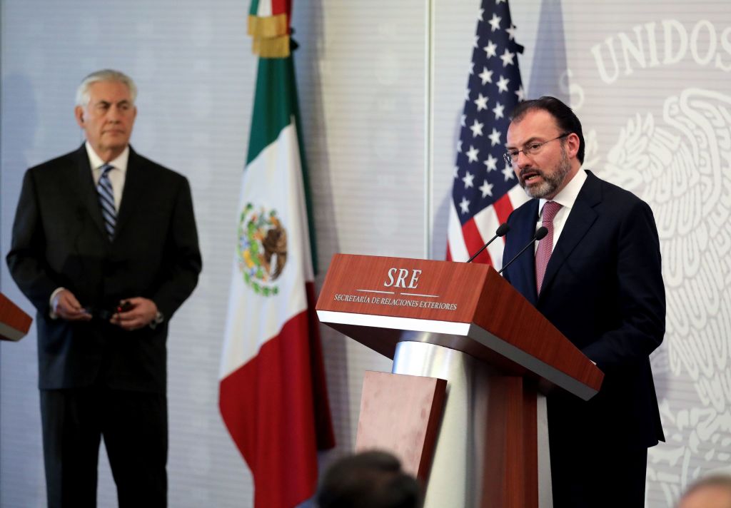 US Secretary of State Rex Tillerson (L) listens to Mexican Foreign Minister Luis Videgaray as they offer a joint press conference at the Foreign Ministry building in Mexico City on February 23, 2017. Mexico vowed not to let the United States impose migration reforms on it as its leaders prepared Thursday to host US officials Tillerson and Homeland Security chief John Kelly who are cracking down on illegal immigrants. / AFP / POOL / Carlos BARRIA (Photo credit should read CARLOS BARRIA/AFP/Getty Images)
