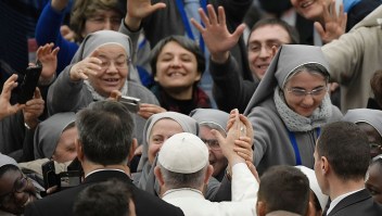 Pope Francis greets nuns during an audience to the participants in the national Office for Pastoral Care for Vocations of the Italian Episcopal Conference at the Paul VI audience Hall on January 5, 2017 in Vatican. / AFP / Tiziana FABI (Photo credit should read TIZIANA FABI/AFP/Getty Images)