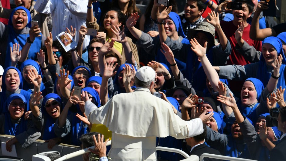 Pope Francis greets nuns at the end of the Palm Sunday mass, on April 9, 2017 at St Peter's square in Vatican. Palm Sunday is the final Sunday of Lent, the beginning of the Holy Week, and commemorates the triumphant arrival of Jesus Christ in Jerusalem, days before he was crucified. / AFP PHOTO / Vincenzo PINTO (Photo credit should read VINCENZO PINTO/AFP/Getty Images)