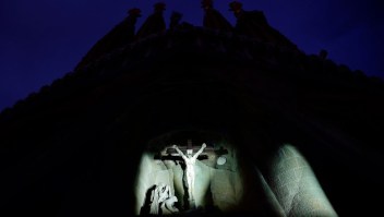 Lights illuminate the the 12 sculptures depicting Jesus Christ on the day of his crucifixion by Josep Maria Subirachs, on the Passion facade (Western side) of the Basilica and Expiatory Church of the Holy Family (Sagrada Familia), in Barcelona on April 10, 2017 during holy week celebrations. / AFP PHOTO / LLUIS GENE (Photo credit should read LLUIS GENE/AFP/Getty Images)