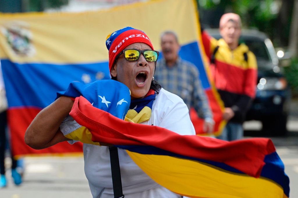 Demonstrators against Nicolas Maduro's government start gathering at the east side of Caracas on April 19, 2017. Venezuela braced for rival demonstrations Wednesday for and against President Nicolas Maduro, whose push to tighten his grip on power has triggered waves of deadly unrest that have escalated the country's political and economic crisis. / AFP PHOTO / FEDERICO PARRA (Photo credit should read FEDERICO PARRA/AFP/Getty Images)