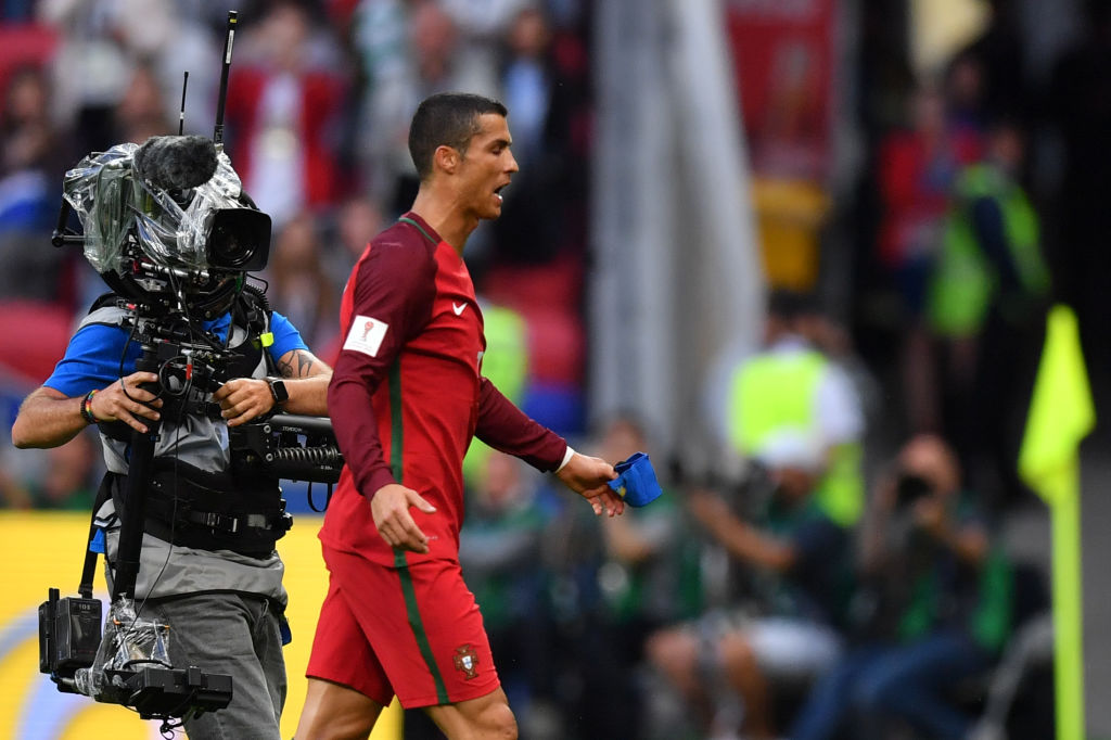 Portugal's forward Cristiano Ronaldo walks off the pitch after the 2017 Confederations Cup group A football match between Portugal and Mexico at the Kazan Arena in Kazan on June 18, 2017. / AFP PHOTO / Yuri CORTEZ (Photo credit should read YURI CORTEZ