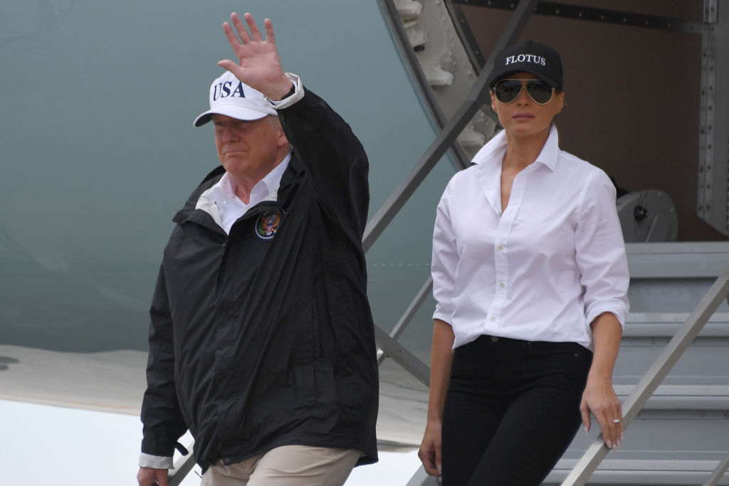 US President Donald Trump and First Lady Melania Trump arrive n Corpus Christi, Texas on August 29, 2017. President Donald Trump flew into storm-ravaged Texas Tuesday in a show of solidarity and leadership in the face of the deadly devastation wrought by Harvey -- as the battered US Gulf Coast braces for even more torrential rain. Four days after Harvey slammed onshore as a monster Category Four hurricane, turning roads to rivers in America's fourth-largest city, emergency crews are still racing to reach hundreds of stranded people in a massive round-the-clock rescue operation. / AFP PHOTO / JIM WATSON (Photo credit should read JIM WATSON/AFP/Getty Images)