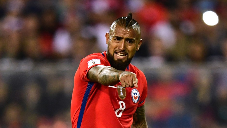 Chile's Arturo Vidal gestures during the 2018 World Cup qualifier football match against Paraguay, in Santiago, on August 31, 2017. / AFP PHOTO / Martin BERNETTI (Photo credit should read MARTIN BERNETTI/AFP/Getty Images)