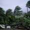 TOPSHOT - A picture taken on September 19, 2017 shows the powerful winds and rains of hurricane Maria battering the city of Petit-Bourg on the French overseas Caribbean island of Guadeloupe. Hurricane Maria strengthened into a "potentially catastrophic" Category Five storm as it barrelled into eastern Caribbean islands still reeling from Irma, forcing residents to evacuate in powerful winds and lashing rain. / AFP PHOTO / Cedrik-Isham Calvados (Photo credit should read CEDRIK-ISHAM CALVADOS/AFP/Getty Images)