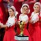Russia's Igor Moiseyev Ballet ensemble dance next to the FIFA World Cup trophy ahead of the 2018 FIFA World Cup football tournament final draw at the State Kremlin Palace in Moscow on December 1, 2017. The 2018 FIFA World Cup will be held between June 14 and July 15, 2018 in 11 Russian cities. / AFP PHOTO / Kirill KUDRYAVTSEV (Photo credit should read KIRILL KUDRYAVTSEV/AFP/Getty Images)