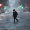 BOSTON, MA - JANUARY 04: People walk through the empty streets of Boston as the snow begins to fall during a massive winter storm on January 4, 2018 in Boston, United States. Schools and businesses throughout the Boston area are closed as the city is expecting over a foot of snow and blizzard like conditions throughout the day. (Photo by Spencer Platt/Getty Images)