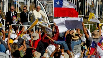 Pope Francis waves from the popemobile as he arrives at Maquehue airport in Temuco, 800 km south of Santiago, to celebrate an open-air mass on January 17, 2018. Pope Francis arrived to the heartland of the Mapuche, Chile's largest indigenous group, which complains of discrimination and abuse and is seeking the return of ancestral lands now in private hands. The visiting Pontiff will pay a short visit to Temuco to make direct contact with Mapuche leaders after presiding over a huge open air mass. / AFP PHOTO / Claudio Reyes (Photo credit should read CLAUDIO REYES/AFP/Getty Images)