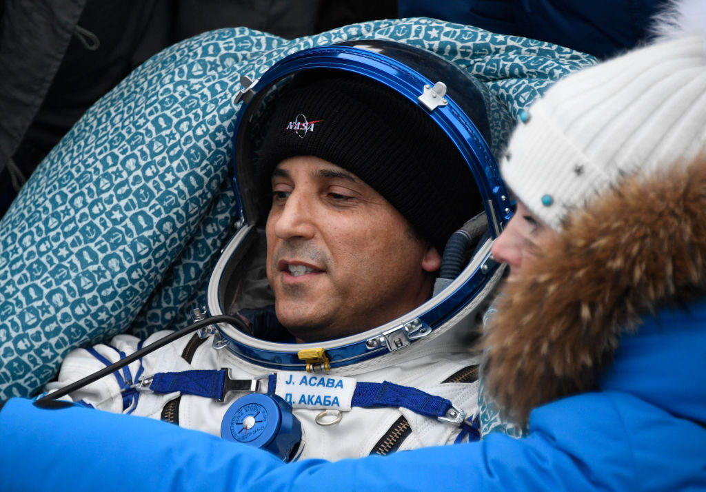 NASA astronaut Joe Acaba rests in a chair after landing in a remote area outside the town of Dzhezkazgan (Zhezkazgan), Kazakhstan, on February 28, 2018. Two NASA astronauts and a Russian cosmonaut returned to Earth on February 28, 2018, rounding off a mission of more than five months aboard the International Space Station. Alexander Misurkin of Russia's Roscosmos space agency and NASA's Mark Vande Hei and Joe Acaba touched down on steppe land southeast of the town of Dzhezkazgan in central Kazakhstan at the expected time of 0231 GMT. / AFP PHOTO / POOL / ALEXANDER NEMENOV (Photo credit should read ALEXANDER NEMENOV/AFP/Getty Images)