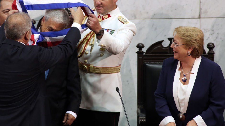 R) looks on during the inauguration ceremony at the Congress in Valparaiso, Chile, on March 11, 2018. Rightwing billionaire businessman Pinera was sworn in as the new president of Chile for the second time. / AFP PHOTO / CLAUDIO REYES (Photo credit should read CLAUDIO REYES/AFP/Getty Images)