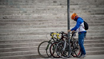A cyclist arrives to participate in the Fifth World Bicycle Forum, an organization that aims to promote bicycles in cities which is taking place until April 5, in Santiago on April 1, 2016. AFP PHOTO MARTIN BERNETTI / AFP / MARTIN BERNETTI (Photo credit should read MARTIN BERNETTI/AFP/Getty Images)