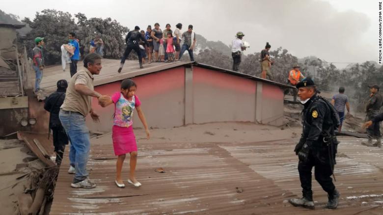 CHIMALTENANGO, June 4, 2018 Civil Protection members evacuate residents from a house during the eruption of the ''Volcan de Fuego'', in Acatenango, Chimaltenango Department, Guatemala, on June 3, 2018. At least seven people have been killed and 296 others injured in Guatemala as a highly active volcano near the country's capital erupted for the second time this year, authorities said Sunday. rtg) (ah) (Credit Image: ?? Prensa Libre/Xinhua via ZUMA Wire)