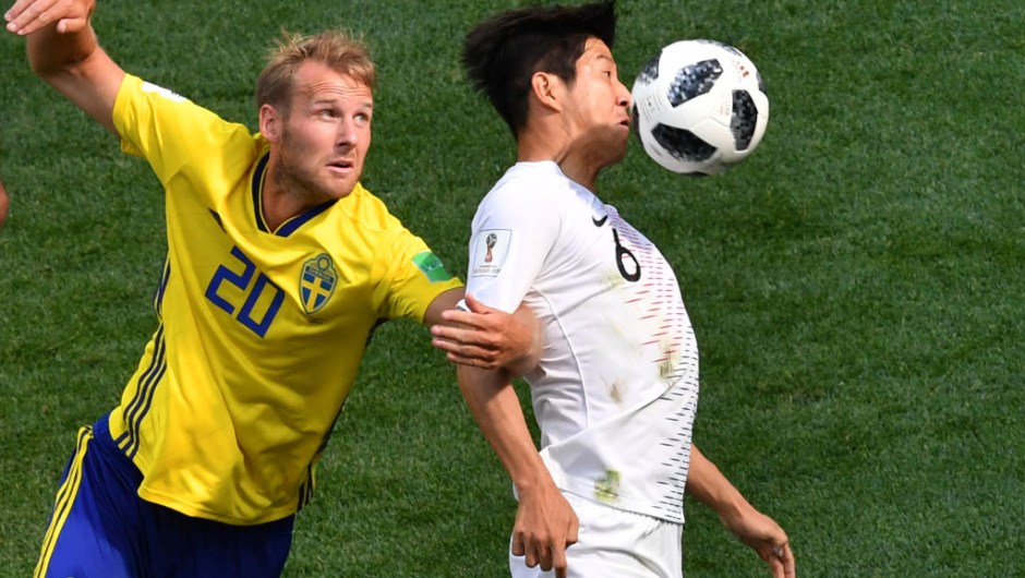 South Korea's defender Park Joo-ho (R) controls the ball ahead of Sweden's forward Ola Toivonen during the Russia 2018 World Cup Group F football match between Sweden and South Korea at the Nizhny Novgorod Stadium in Nizhny Novgorod on June 18, 2018. (Photo by Dimitar DILKOFF / AFP) / RESTRICTED TO EDITORIAL USE - NO MOBILE PUSH ALERTS/DOWNLOADS (Photo credit should read DIMITAR DILKOFF/AFP/Getty Images)