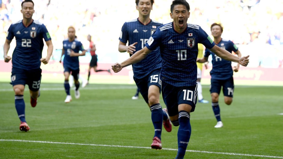 f Japan celebrates after scoring a penalty for his team's first goal during the 2018 FIFA World Cup Russia group H match between Colombia and Japan at Mordovia Arena on June 19, 2018 in Saransk, Russia. (Photo by Carl Court/Getty Images)