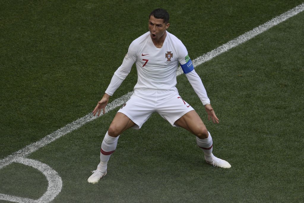Portugal's forward Cristiano Ronaldo celebrates his opening goal for Portugal during the Russia 2018 World Cup Group B football match between Portugal and Morocco at the Luzhniki Stadium in Moscow on June 20, 2018. (Photo by Juan Mabromata / AFP) / RESTRICTED TO EDITORIAL USE - NO MOBILE PUSH ALERTS/DOWNLOADS (Photo credit should read JUAN MABROMATA/AFP/Getty Images)