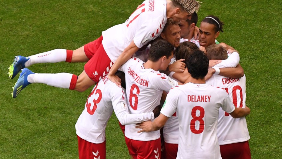 TOPSHOT - Denmark's midfielder Christian Eriksen (R) celebrates with teammates after scoring a goal during the Russia 2018 World Cup Group C football match between Denmark and Australia at the Samara Arena in Samara on June 21, 2018. (Photo by EMMANUEL DUNAND / AFP) / RESTRICTED TO EDITORIAL USE - NO MOBILE PUSH ALERTS/DOWNLOADS (Photo credit should read EMMANUEL DUNAND/AFP/Getty Images)