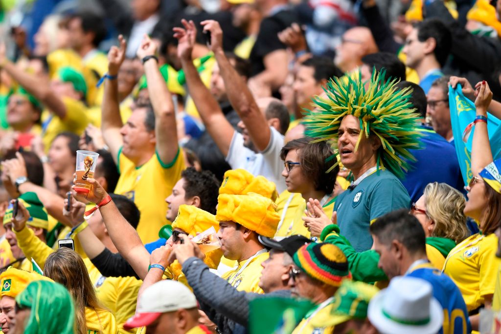 Brazil fans cheer before the Russia 2018 World Cup Group E football match between Brazil and Costa Rica at the Saint Petersburg Stadium in Saint Petersburg on June 22, 2018. (Photo by GABRIEL BOUYS / AFP) / RESTRICTED TO EDITORIAL USE - NO MOBILE PUSH ALERTS/DOWNLOADS (Photo credit should read GABRIEL BOUYS/AFP/Getty Images)