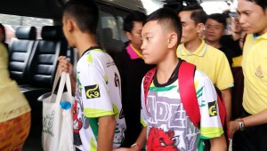 epa06896130 Two of the twelve rescued members of the Wild Boar soccer team depart from the Chiangrai Prachanukroh Hospital in Chiang Rai province, Thailand, 18 July 2018. The 13 members of the Wild Boar child soccer team, including their assistant coach, who were trapped in the Tham Luang cave since 23 June 2018, will make their first appearance for a tightly-controlled interview with media after they were rescued, before returning to their homes with families. EPA-EFE/CHAICHAN CHAIMUN