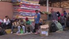 Venezolanos viven en una terminal de transporte en Ecuador
