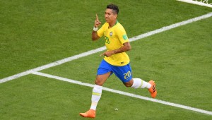SAMARA, RUSSIA - JULY 02: Roberto Firmino of Brazil celebrates after scoring his team's second goal during the 2018 FIFA World Cup Russia Round of 16 match between Brazil and Mexico at Samara Arena on July 2, 2018 in Samara, Russia. (Photo by Hector Vivas/Getty Images)