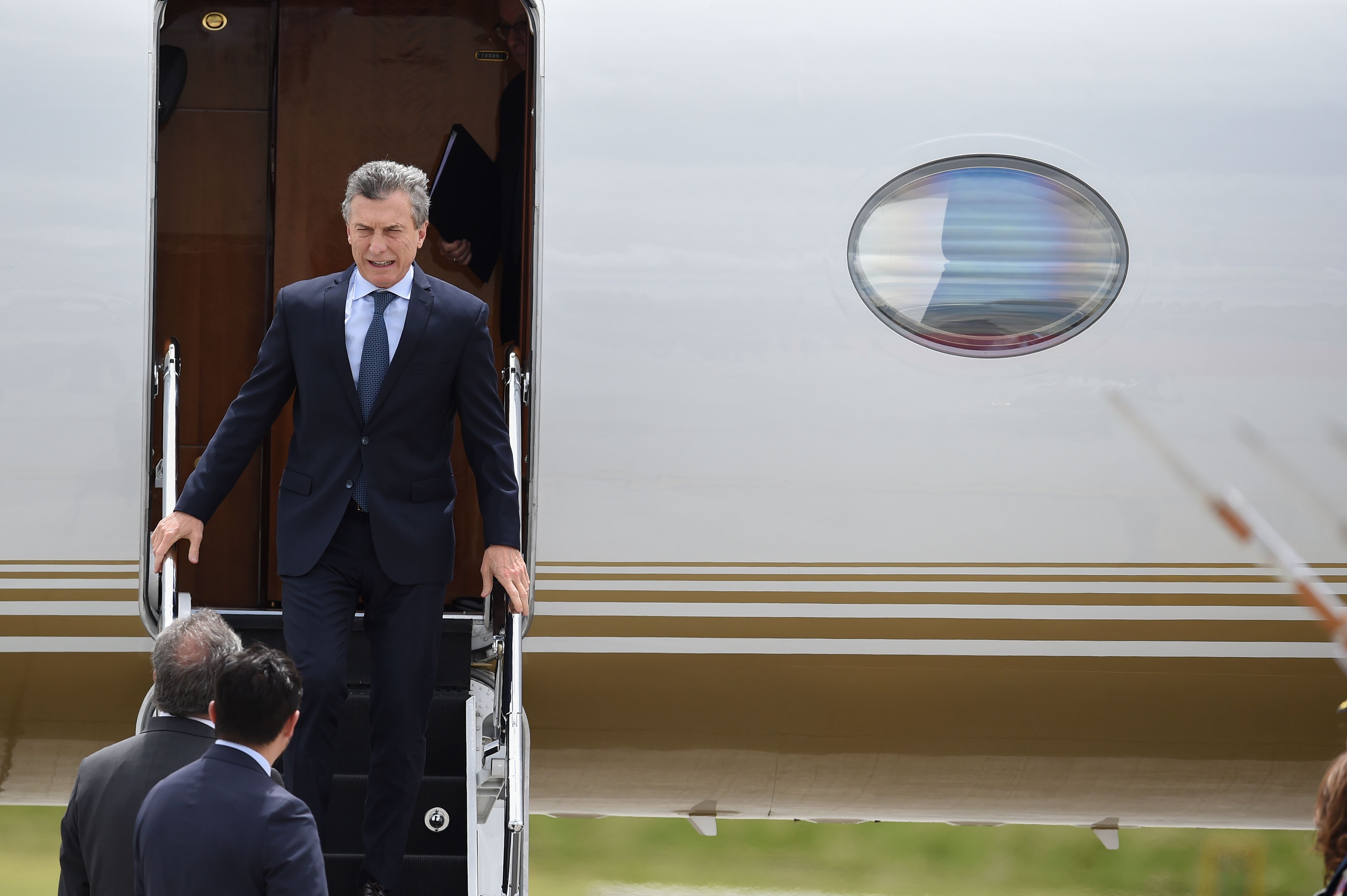 Argentine President Mauricio Macri arrives on August 7, 2018 at the CATAM military airport in Bogota, where he will attend Colombia's President Ivan Duque swearing-in ceremony. - Duque has his work cut out for him as he takes office Tuesday amid heightened tensions with neighbouring Venezuela and the lingering difficulties of peace-building with the nation's rebel groups. (Photo by Diana SANCHEZ / AFP) (Photo credit should read DIANA SANCHEZ/AFP/Getty Images)