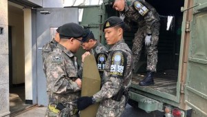 Las Coreas retiran armas de su frontera