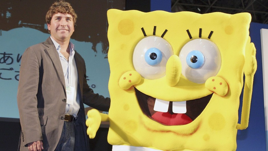 TOKYO, JAPAN - MARCH 23: Stephen Hillenburg, the writer of a U.S. cartoon "The SpongeBob SquarePants" poses with its charactor SpongeBob SquarePants at an event held at Tokyo International Anime Fair on March 23, 2006 in Tokyo, Japan. The film of this popular U.S. Cartoon will open on April 22 in Japan. (Photo by Junko Kimura/Getty Images)