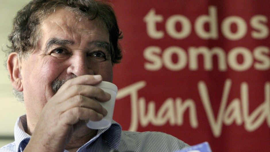 Bogota, COLOMBIA: Carlos Sanchez, former "Juan Valdez" coffee grower icon, drinks a cup of coffee during a press conference 30 May, 2006 in Bogota. Sanchez, who for almost 37 years embodied the fictional Colombian Juan Valdez, announced he will hand over this representative character to a younger man. AFP PHOTOAlejandra VEGA (Photo credit should read ALEJANDRA VEGA/AFP/Getty Images)