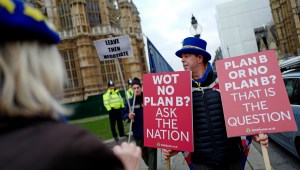 Anti-Brexit campaigner Steve Bray (R) holds a placard that reads "Wot No Plan B? Ask The Nation" as he demonstrates outside the Houses of Parliament in central London on January 21, 2019, before Britain's Prime Minister Theresa May makes a statement to the House of Commons on changes to her Brexit withdrawal agreement. - British Prime Minister Theresa May unveils her Brexit "Plan B" to parliament on Monday after MPs shredded her EU divorce deal, deepening the political gridlock 10 weeks from departure day. (Photo by Tolga AKMEN / AFP) (Photo credit should read TOLGA AKMEN/AFP/Getty Images)