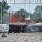 Picture of the three aid trucks which were set ablaze on February 23, 2019 on the Venezuelan side of the Simon Bolivar International Bridge in San Antonio del Tachira, as seen from across the border in Cucuta, Colombia, on February 26, 2019. - A total of 326 members of Venezuela's armed forces have deserted embattled President Nicolas Maduro and crossed the border into Colombia since Saturday, Bogota's migration service said Tuesday. Most of the deserting soldiers slipped into Colombia in the same area as the main border crossing blocked by Venezuela's military, Migration Colombia said. (Photo by Luis ROBAYO / AFP) (Photo credit should read LUIS ROBAYO/AFP/Getty Images)