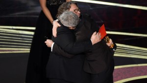 HOLLYWOOD, CALIFORNIA - FEBRUARY 24: Alfonso Cuaron accepts the Best Director award for 'Roma' from Guillermo del Toro onstage during the 91st Annual Academy Awards at Dolby Theatre on February 24, 2019 in Hollywood, California. (Photo by Kevin Winter/Getty Images)