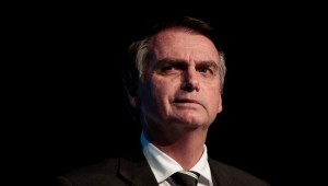 The Brazilian presidential candidate for the Social Liberal Party, Jair Bolsonaro, gestures during the Brazilian Sugarcane Industry Association's Unica Forum 2018 in Sao Paulo, Brazil, on June 18, 2018. - Brazil holds general elections in October. (Photo by Miguel SCHINCARIOL / AFP) (Photo credit should read MIGUEL SCHINCARIOL/AFP/Getty Images)