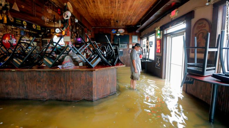 Donz on Lakeshore Drive in Mandeville takes on water as Tropical Storm Barry's winds push water over the Lake Pontchartrain seawall Saturday, July 13, 2019. (David Grunfeld/The Advocate via AP)