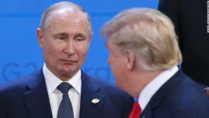 BUENOS AIRES, ARGENTINA - NOVEMBER,30 (RUSSIA OUT) U.S. President Donald Trump (R) looks on Russian President Vladimir Putin (L) during the welcoming ceremony prior to the G20 Summit's Plenary Meeting in Buenos Aires, Argentina, November,30,2018. U.S.Preisident Donald Trump has cancelled his meeting with Vladimir Putin at the G20 Summit in Argentina planned on Saturday. (Photo by Mikhail Svetlov/Getty Image