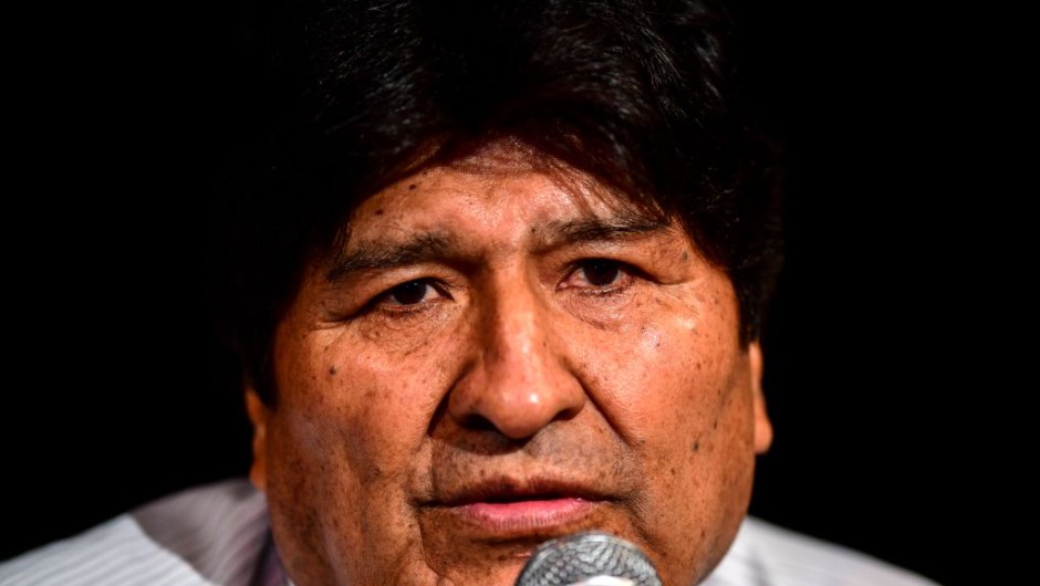 Bolivia's ex-President Evo Morales gestures during a press conference in Buenos Aires, on December 17, 2019. - Bolivia's interim president Jeanine Anez has said an arrest warrant will soon be issued against former president Evo Morales, who has received asylum in neighboring Argentina. (Photo by RONALDO SCHEMIDT / AFP) (Photo by RONALDO SCHEMIDT/AFP via Getty Images)