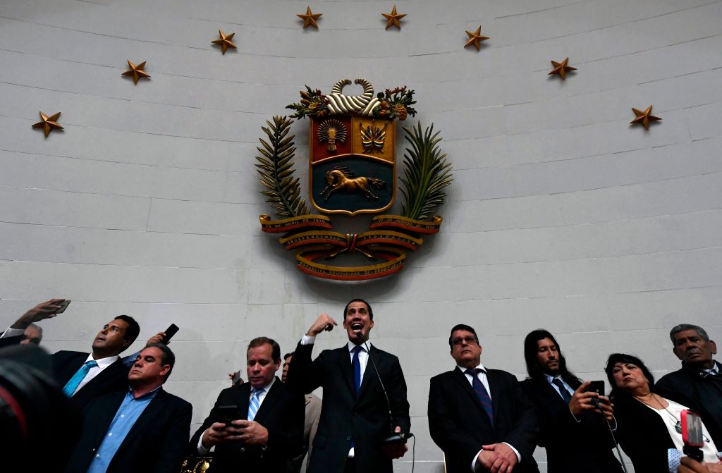Venezuelan opposition leader and self-proclaimed acting president Juan Guaido speaks at the National Assembly, in Caracas, on January 7, 2020. - Opposition leader Juan Guaido and a rival lawmaker, Luis Parra -who both had claimed to be Venezuela's parliament speaker, following two separate votes and accusations of a "parliamentary coup- called for a parliamentary session today. (Photo by Federico Parra / AFP) (Photo by FEDERICO PARRA/AFP via Getty Images)