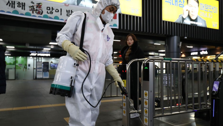 SEOUL, SOUTH KOREA - JANUARY 24: A disinfection worker wearing protective gears spray anti-septic solution in an train terminal amid rising public concerns over the spread of China's Wuhan Coronavirus at SRT train station on January 24, 2020 in Seoul, South Korea. The number of cases of a deadly new coronavirus rose to over 800 in mainland China as health officials stepped up efforts to contain the spread of the pneumonia-like disease which medicals experts confirmed can be passed from human to human. The number of those who have died from the virus in China climbed to twentyfive on Wednesday and cases have been reported in other countries including the United States,Thailand, Japan, Taiwan and South Korea. (Photo by Chung Sung-Jun/Getty Images)