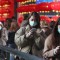 People wear face masks and walk at a shopping mall in Taipei, Taiwan, Friday, Jan. 31, 2020. People wear face masks as they walk through a shopping mall in Taipei, Taiwan, Friday, Jan. 31, 2020. According to the Taiwan Centers of Disease Control (CDC) Friday, the tenth case diagnosed with the new coronavirus has been confirmed in Taiwan. (AP Photo/Chiang Ying-ying)
