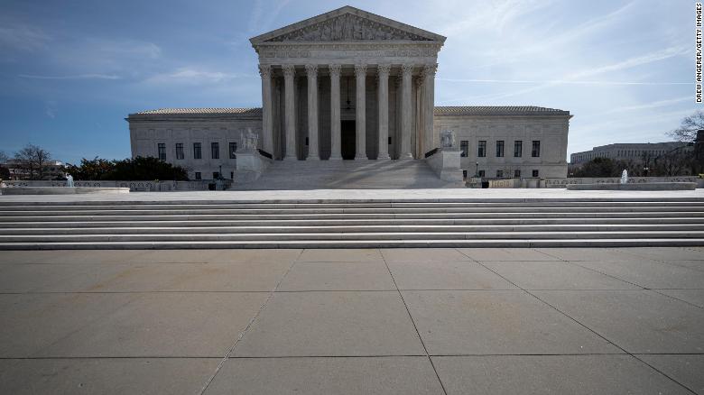 WASHINGTON, DC - MARCH 16: The U.S. Supreme Court stands on March 16, 2020 in Washington, DC. The Supreme Court announced on Monday that it would postpone oral arguments for its March session because of the coronavirus outbreak. (Photo by Drew Angerer/Getty Images)