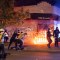 PORTLAND, OR - AUGUST 29: Portland police disperse a crowd after protesters set fire to the Portland Police Association (PPA) building early in the morning on August 29, 2020 in Portland, Oregon. The PPA, a headquarters for the Portland police union, has been a regular target during the 93 days of protests in Portland. (Photo by Nathan Howard/Getty Images)